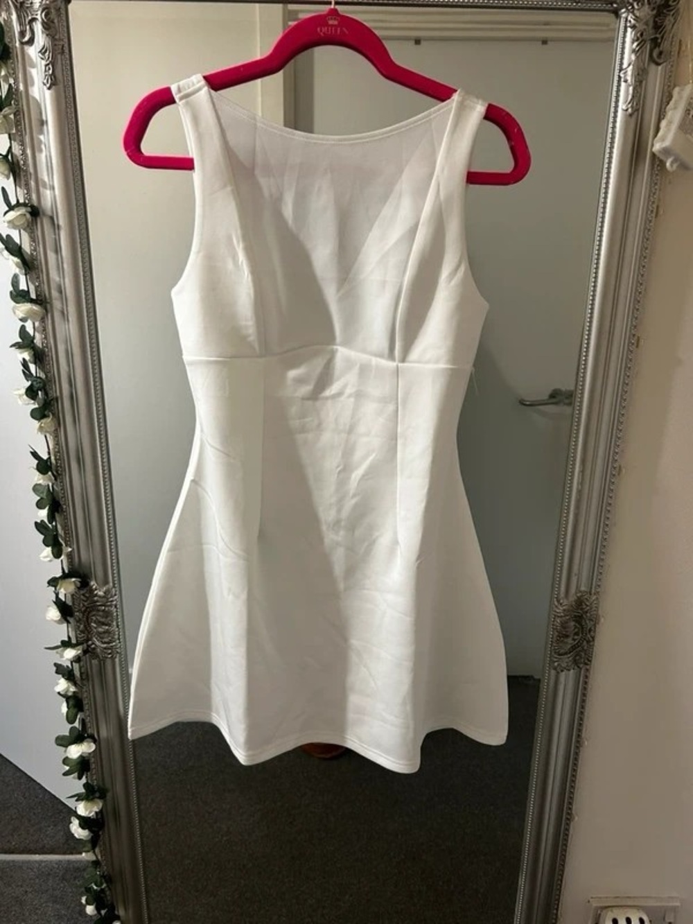 Sleeveless White Mini Dress with Flared Skirt
